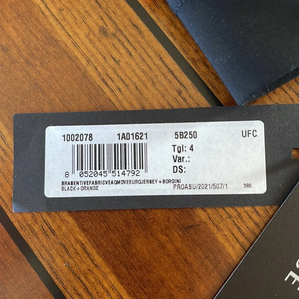 VERSACE NWT LA GRECA SIGNATURE ACCENT SPORTS BRA, BLACK/ORANGE, SIZE 4 (LG) - Picture 12 of 15